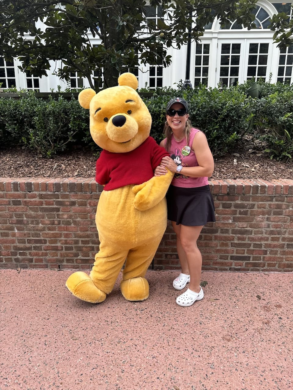 Kate Andrews Disney Travel Agent with Winnie the Pooh